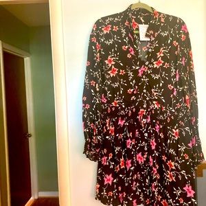 NWT Free People Long Sleeve black floral Dress with elastic waist that ties.